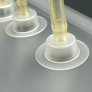 Flange ports are designed to be heat welded into one film layer of a bag offering a way to transfer media through the bag.